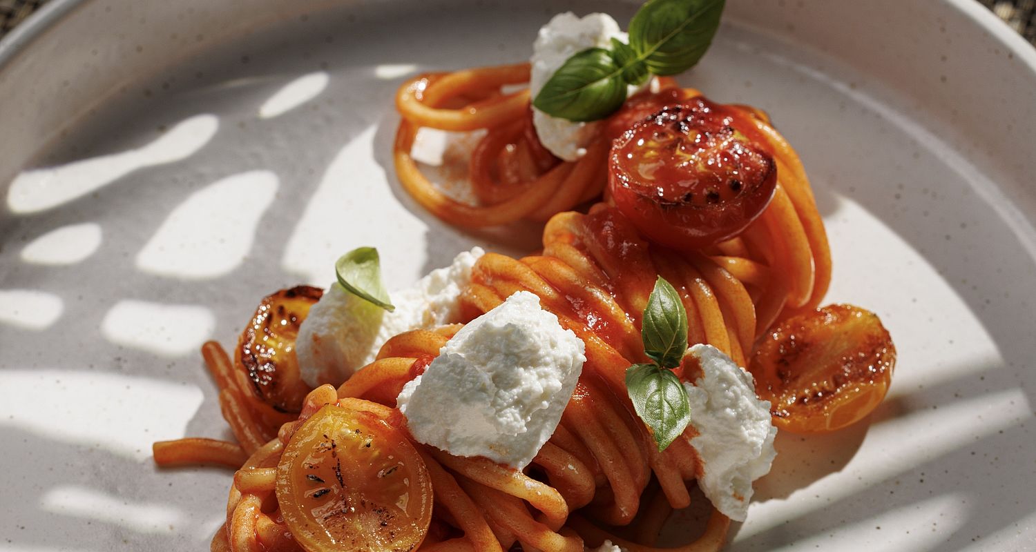 Spaghetti with tomatoes, mozarella at the Genusshotel