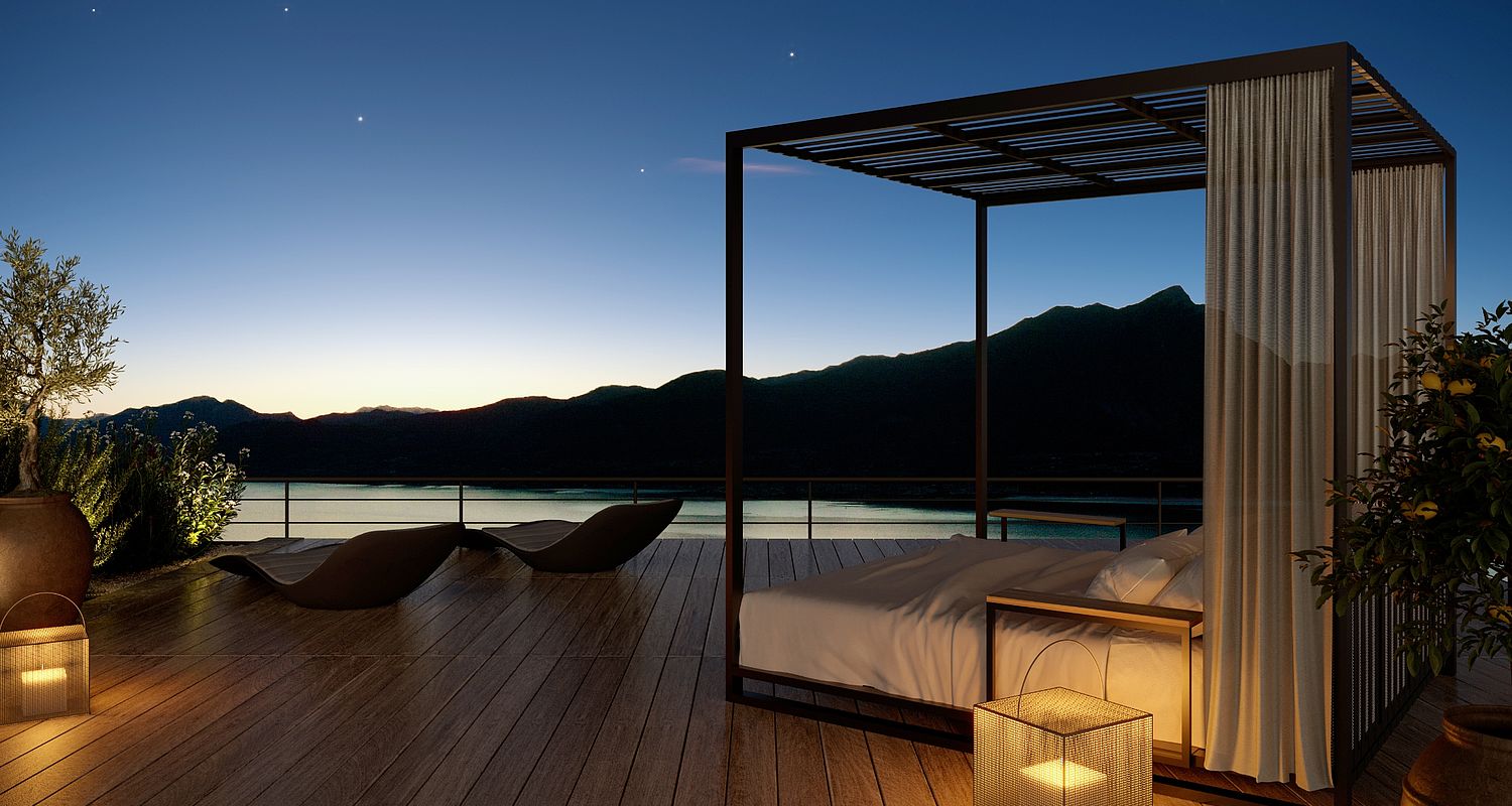 Liegebett auf Terasse in der Nacht im Luxury Resort Gardasee
